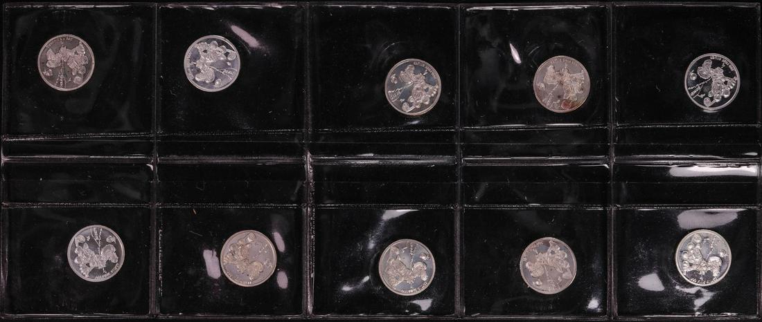 Lot of (10) Disney Mickey & Minnie Mouse Golfer 1/20: One Lot of (10) Disney Mickey & Minnie Mouse Golfer 1/20 oz. .999 Fine Silver Coin Rounds.