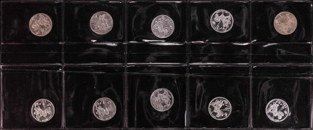 Lot of (10) Disney Mickey & Minnie Mouse Golfer 1/20: One Lot of (10) Disney Mickey & Minnie Mouse Golfer 1/20 oz. .999 Fine Silver Coin Rounds.