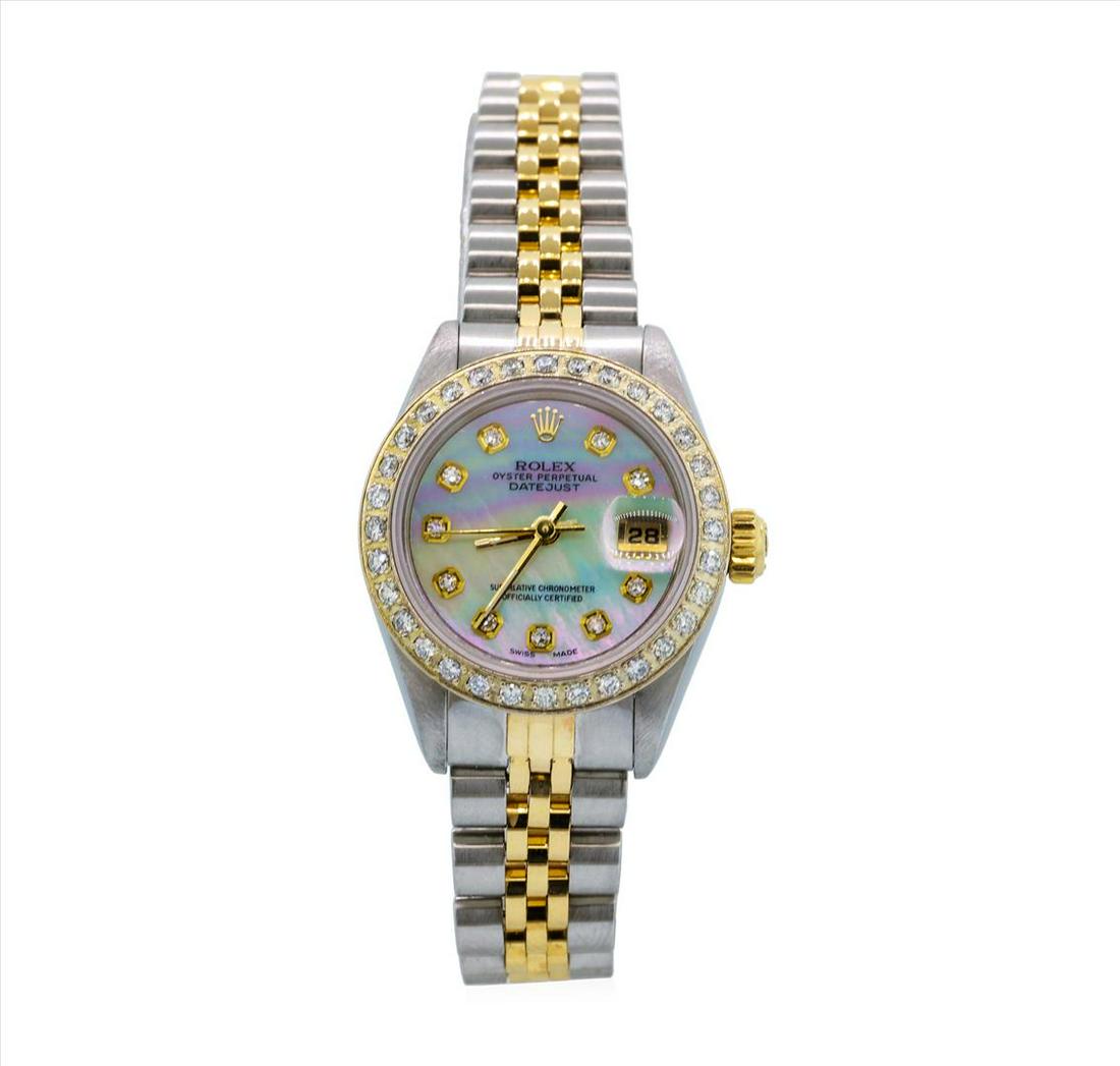 Rolex 18KT Two Tone Gold Datejust Ladies Wristwatch: One ladies, hand crafted & machine milled Rolex DateJust Model wristwatch electro-chemically tested. Stainless Steel Case: 26mm oyster, 18KT Yellow gold Rolex Signature Crown: twinlock with high relie