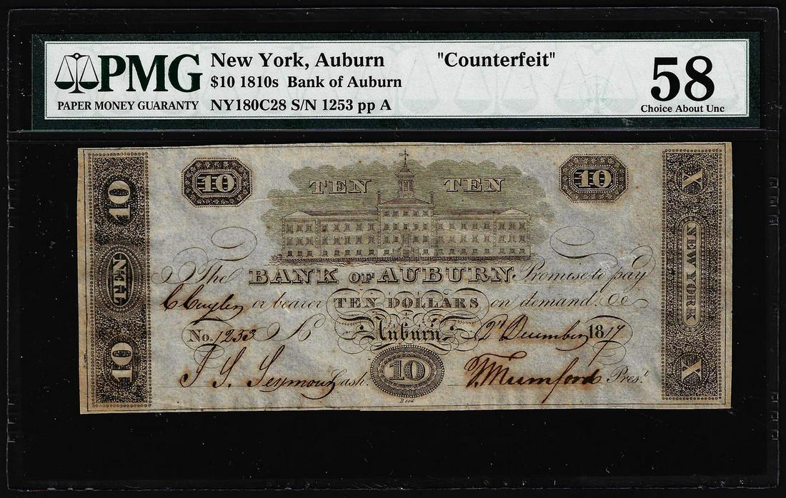 1810's $10 Bank of Auburn NY "Counterfeit" Obsolete: One 1810's $10 Bank of Auburn NY "Counterfeit" Obsolete Note PMG Ch. About Uncirculated 58. PMG Certified.