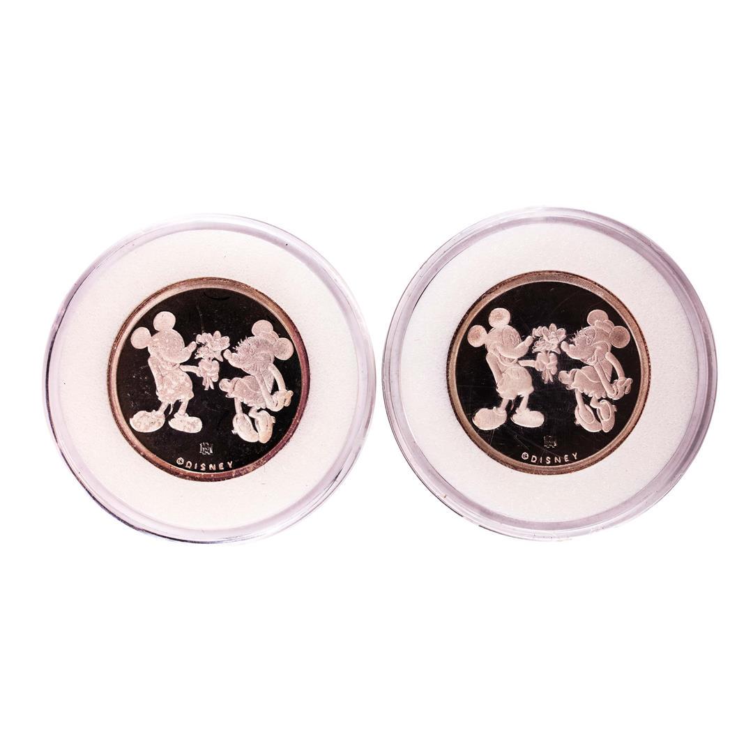 1989 (2) Disney Mickey & Minnie "Yours Forever" 1/4 oz.: One 1989 (2) Disney Mickey & Minnie "Yours Forever" 1/4 oz. .999 Fine Silver Rounds.