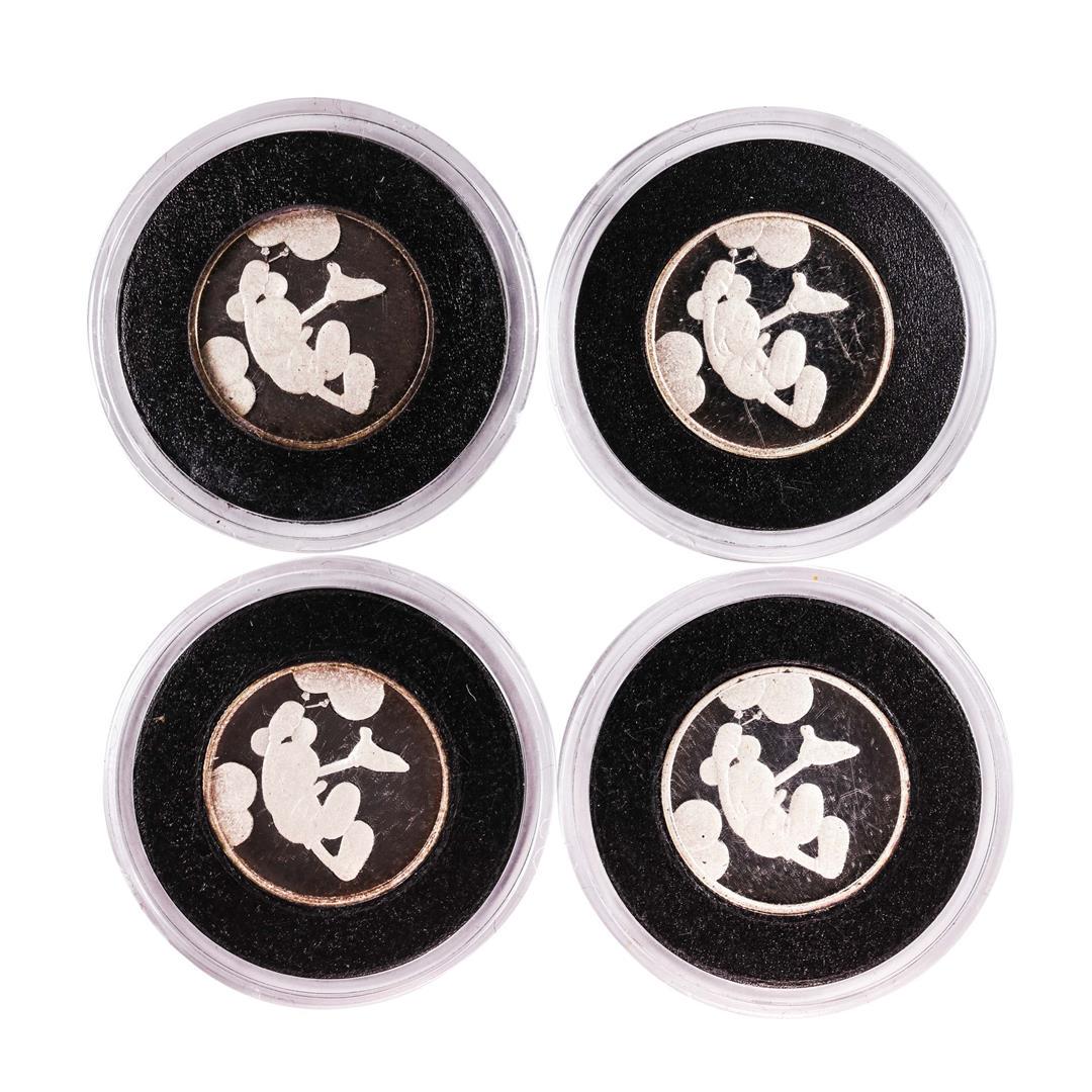 Lot of (4) Disney Mickey "Happy Birthday" 1/10 oz. .999: One Lot of (4) Disney Mickey "Happy Birthday" 1/10 oz. .999 Fine Silver Rounds.