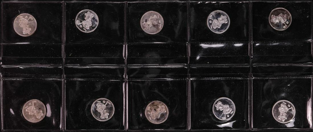 Lot of (10) Disney Mickey & Minnie Mouse Golfer 1/20: One Lot of (10) Disney Mickey & Minnie Mouse Golfer 1/20 oz. .999 Fine Silver Coin Rounds.