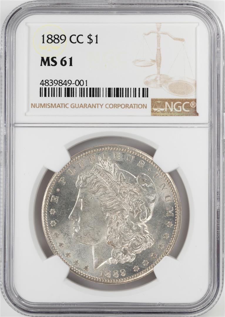 1889-CC $1 Morgan Silver Dollar Coin NGC MS61: One 1889-CC $1 Morgan Silver Dollar Coin NGC MS61. This Mint State example is brightly lustrous and stunning, with silver-white surfaces that show little evidence of the challenges to its very existen