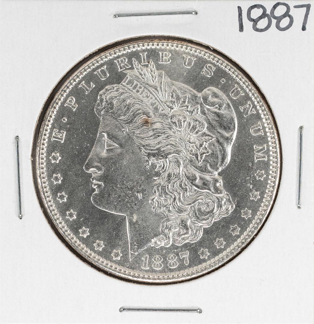 1887 $1 Morgan Silver Dollar Coin: One 1887 $1 Morgan Silver Dollar Coin.
