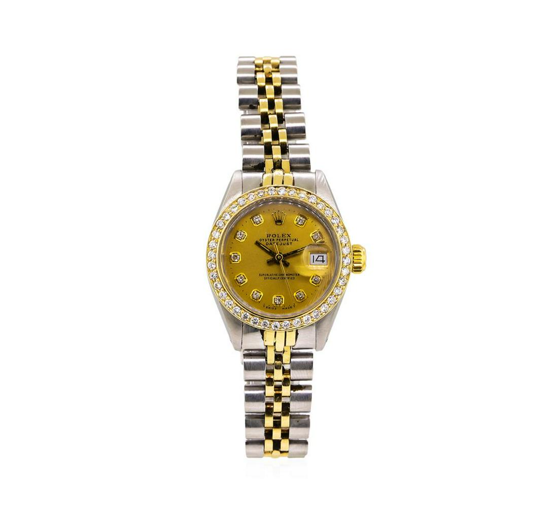 Ladies Two-Tone Rolex Datejust Watch with Diamond Bezel: One ladies, hand crafted & machine milled Rolex DateJust Model wristwatch electronically tested, Stainless Steel Case: 26mm oyster, 14KT Yellow gold Crown: twinlock with logo, non-factory Custom Bezel