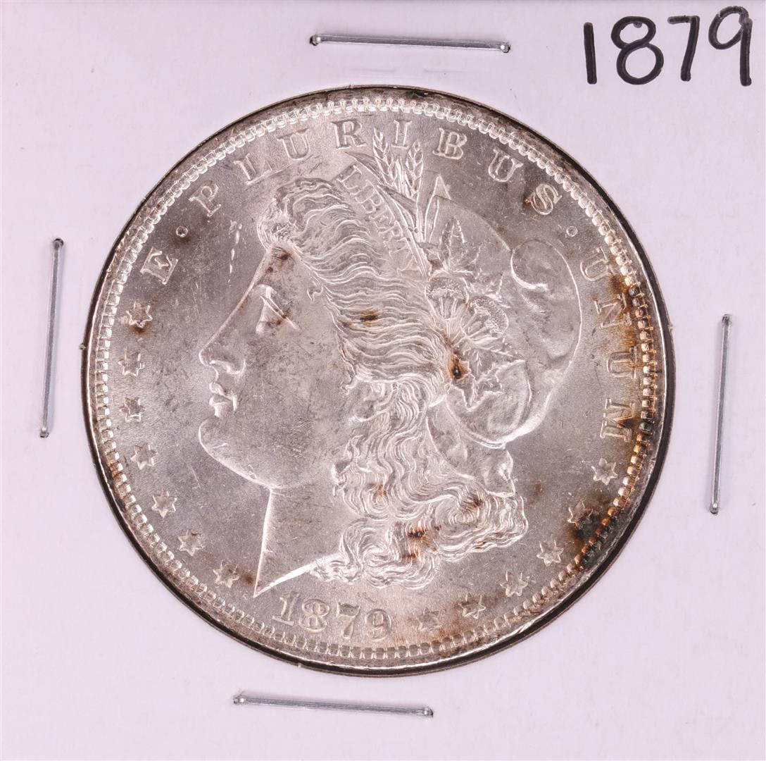 1879 $1 Morgan Silver Dollar Coin: One 1879 $1 Morgan Silver Dollar Coin.