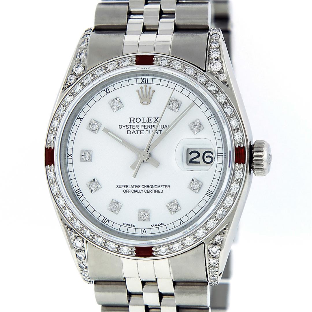 Rolex Men's Stainless Steel Diamond & Ruby Datejust: One Men's Rolex Datejust Polished Bright with Satin Finish, Serviced & Electronically Tested, Stainless Steel Case: 36mm, Custom Diamond Lugs: 28 Diamonds In Lugs, Color: G to H, Clarity: SI-VS. Stain