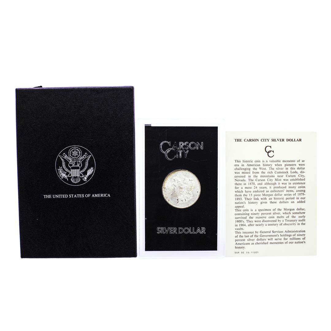 1883-CC $1 Morgan Silver Dollar Coin GSA Hoard w/Box: One 1883-CC $1 Morgan Silver Dollar Coin GSA Hoard w/Box Amazing Reverse Toning.
