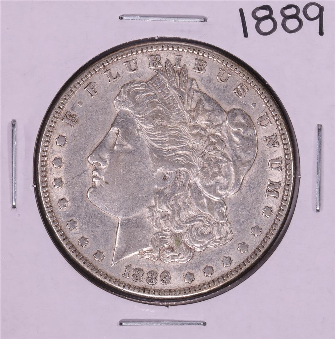 1889 $1 Morgan Silver Dollar Coin: One 1889 $1 Morgan Silver Dollar Coin.