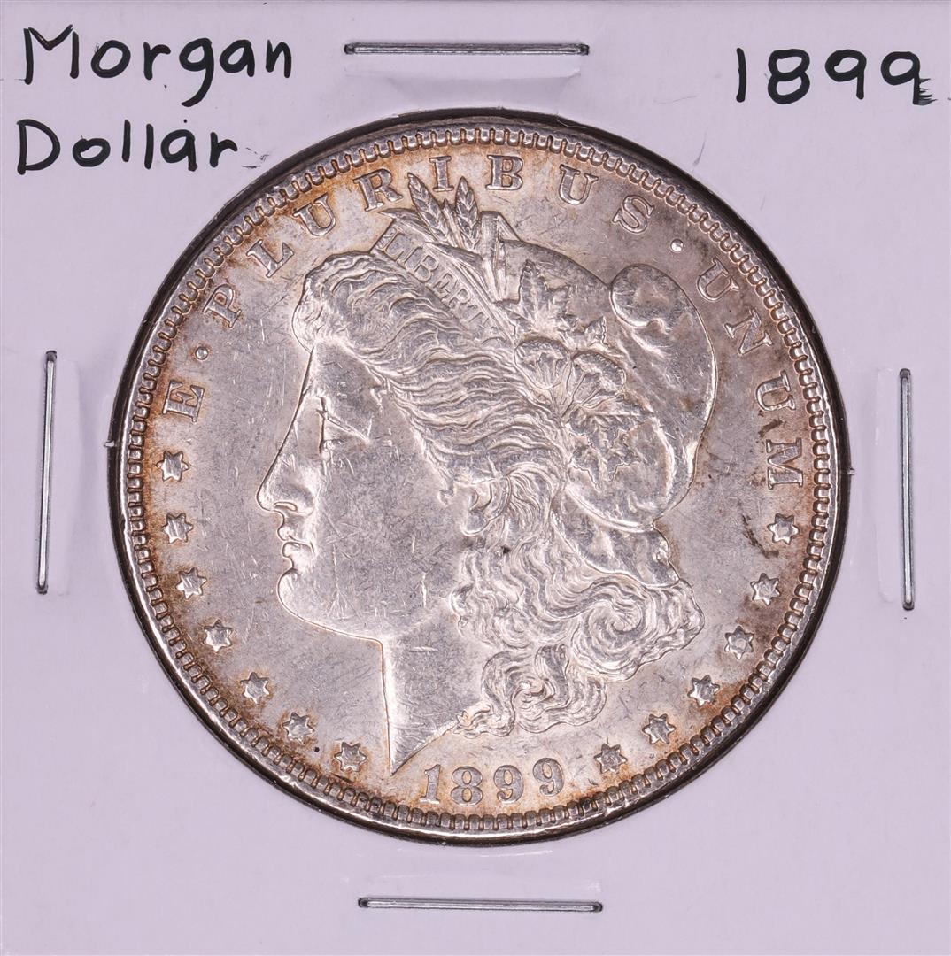 1899 $1 Morgan Silver Dollar Coin: One 1899 $1 Morgan Silver Dollar Coin.