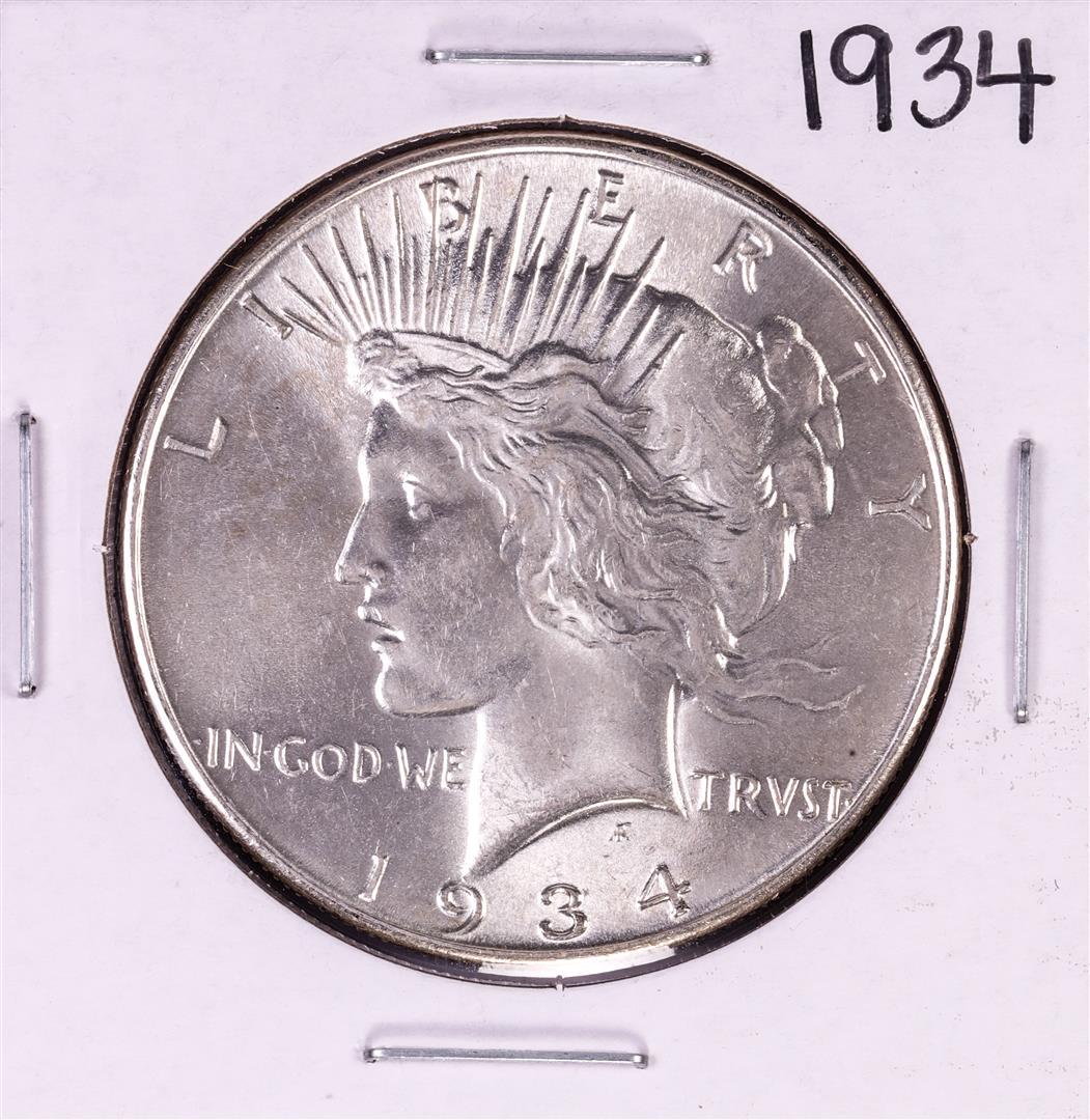 1934 $1 Peace Silver Dollar Coin: One 1934 $1 Peace Silver Dollar Coin.
