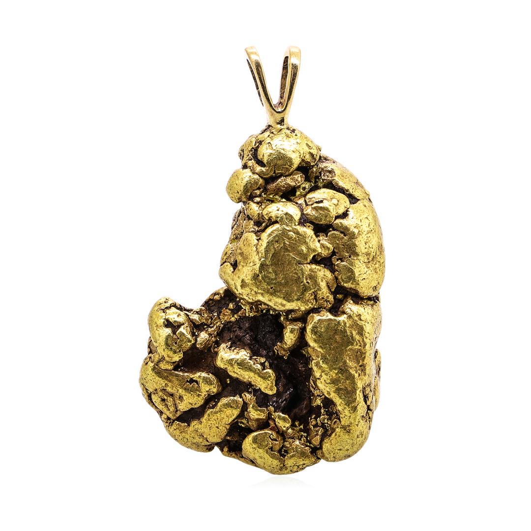 23.27 Gram Yukon Gold Nugget Pendant: One 23.27 Gram Yukon Gold Nugget Pendant.