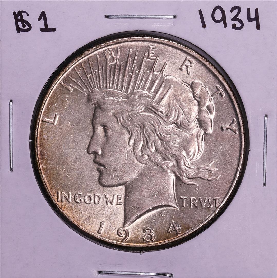 1934 $1 Peace Silver Dollar Coin: One 1934 $1 Peace Silver Dollar Coin.