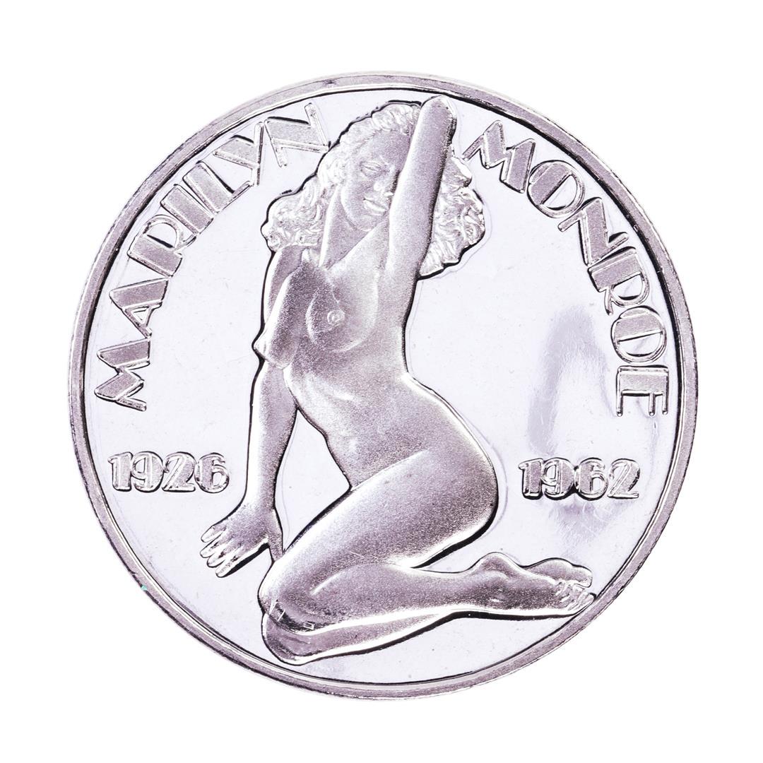 1926-1962 Marilyn Monroe Proof 1oz .999 Fine Silver Round: One 1926-1962 Marilyn Monroe Proof 1oz .999 Fine Silver Round.