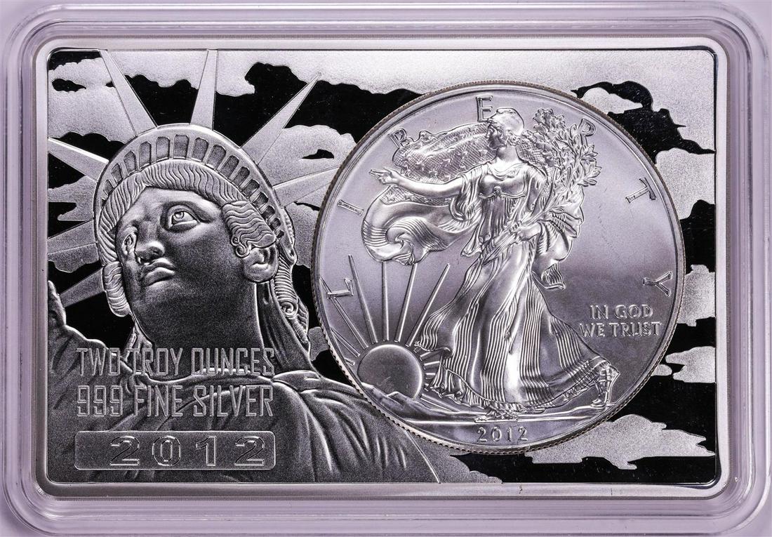 2012 $1 American Silver Eagle Coin & 2oz Silver Bar Set: One 2012 $1 American Silver Eagle Coin & 2oz Silver Bar Set.