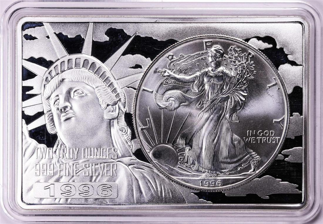 1996 $1 American Silver Eagle Coin & 2oz Silver Bar Set: One 1996 $1 American Silver Eagle Coin & 2oz Silver Bar Set.