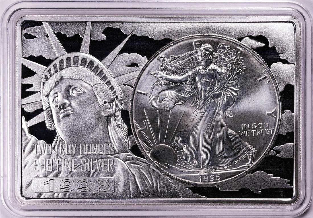 1996 $1 American Silver Eagle Coin & 2oz Silver Bar Set: One 1996 $1 American Silver Eagle Coin & 2oz Silver Bar Set.