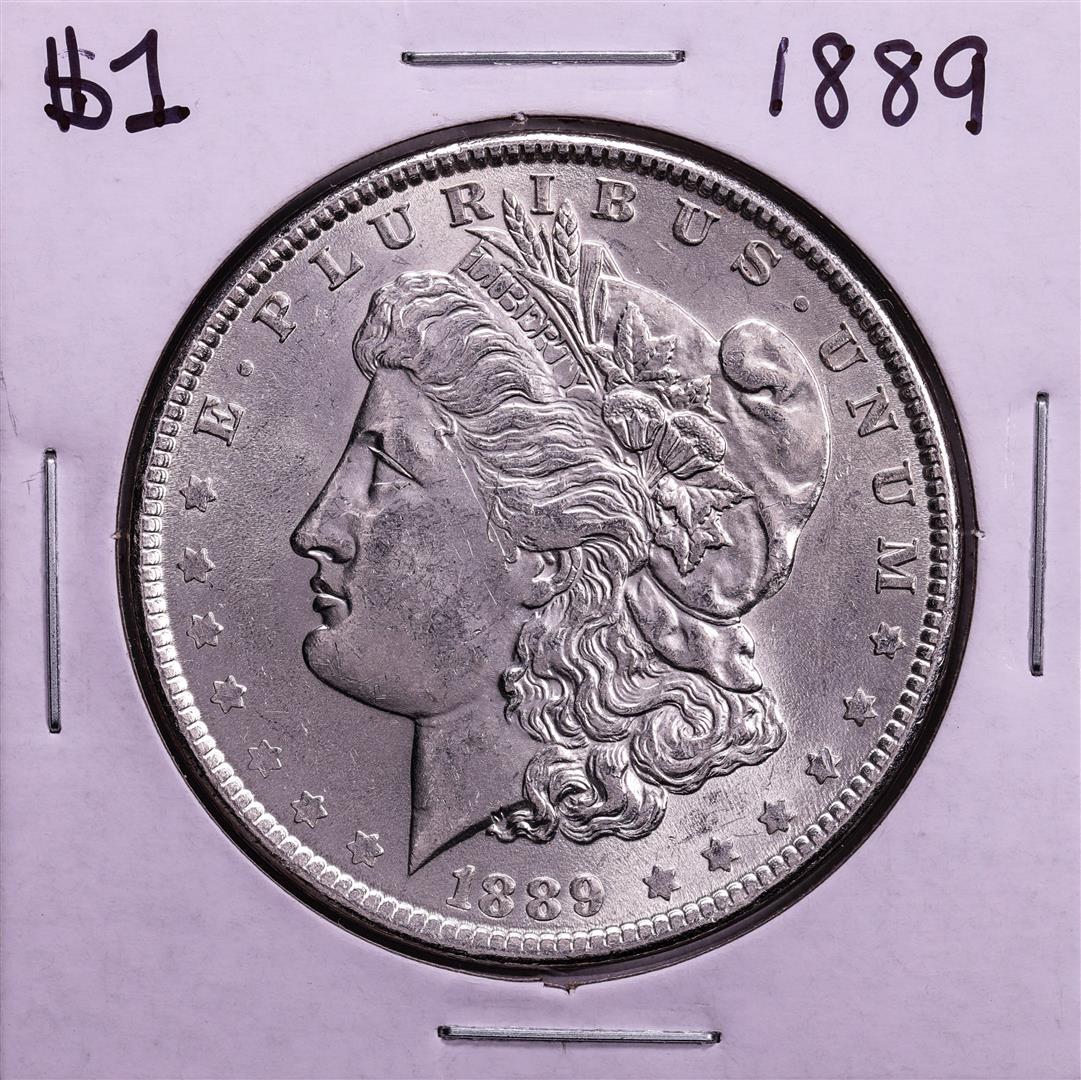 1889 $1 Morgan Silver Dollar Coin: One 1889 $1 Morgan Silver Dollar Coin.