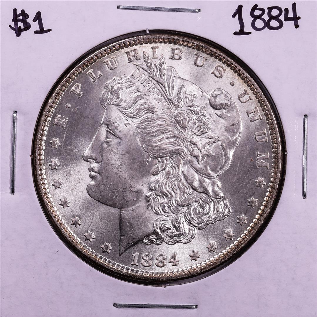 1884 $1 Morgan Silver Dollar Coin: One 1884 $1 Morgan Silver Dollar Coin.