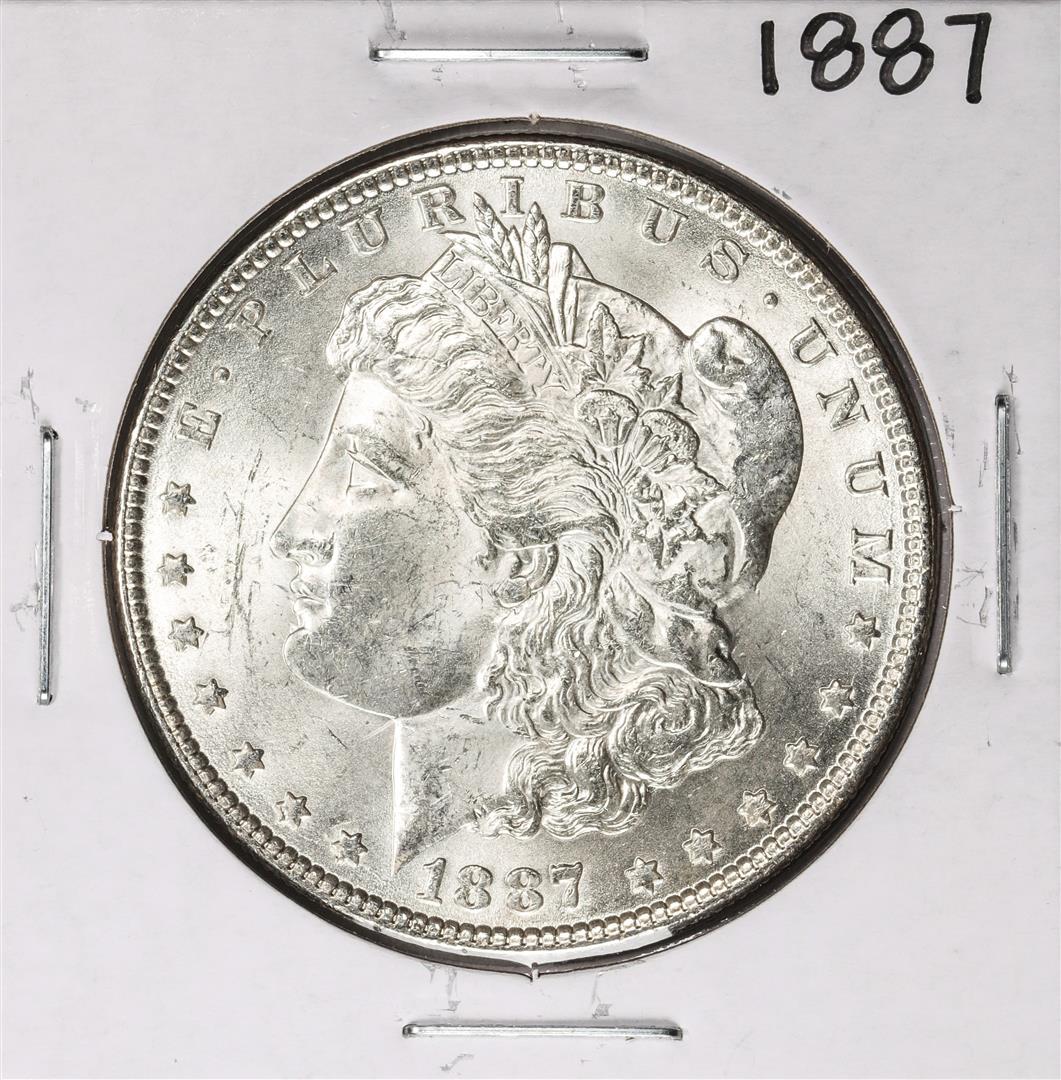 1887 $1 Morgan Silver Dollar Coin: One 1887 $1 Morgan Silver Dollar Coin.