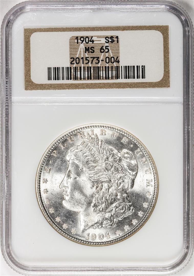 1904 $1 Morgan Silver Dollar Coin NGC MS65: One 1904 $1 Morgan Silver Dollar Coin NGC MS65. NGC Certified.