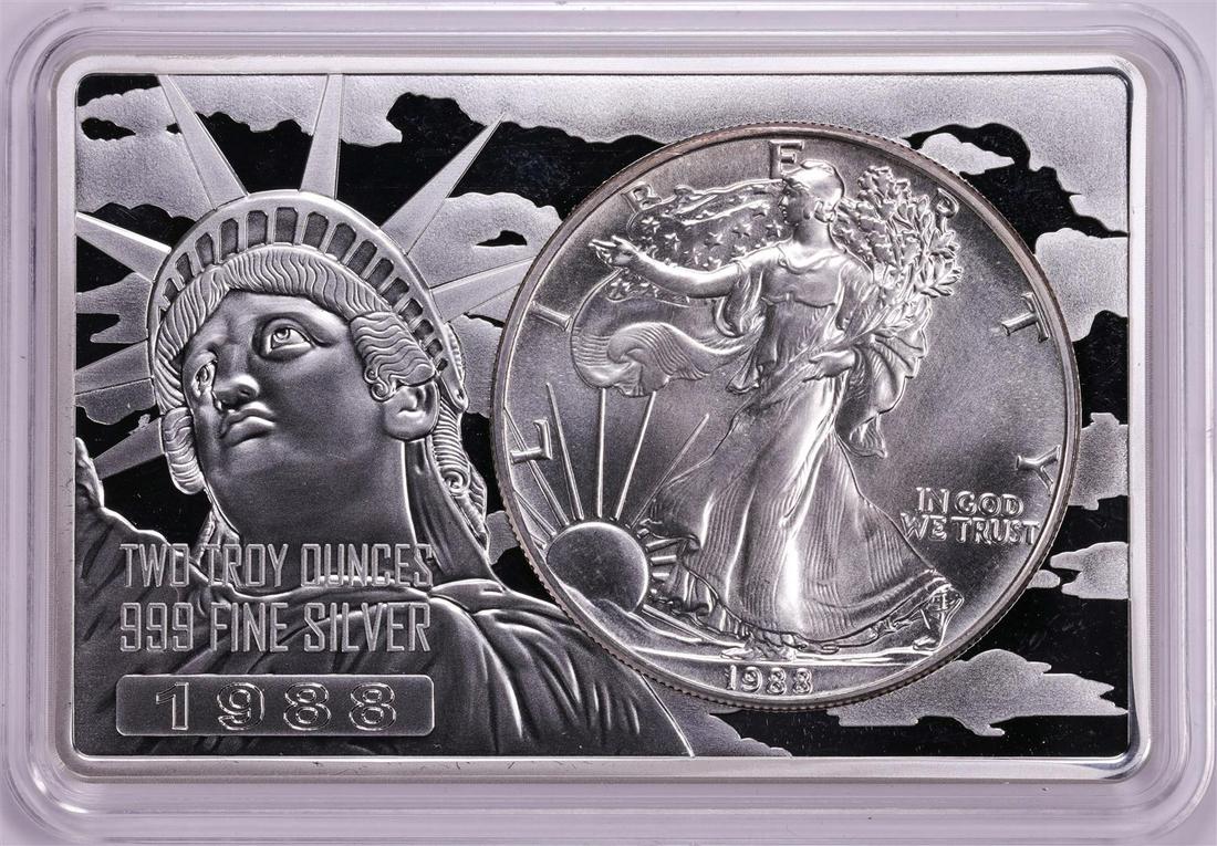 1988 $1 American Silver Eagle Coin & 2oz Silver Bar Set: One 1988 $1 American Silver Eagle Coin & 2oz Silver Bar Set.