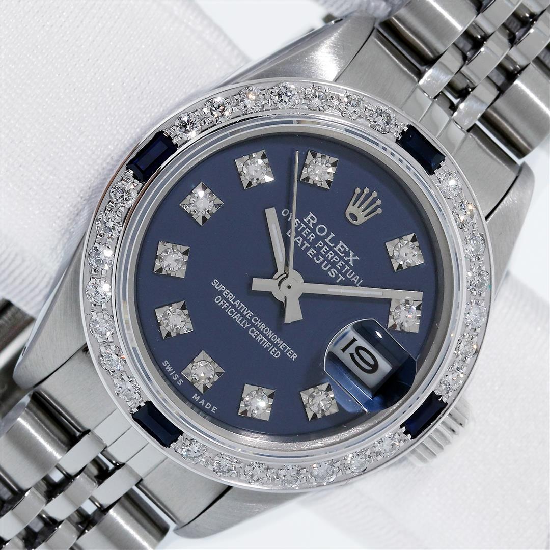 Rolex Ladies Stainless Steel Blue Diamond & Sapphire Datejust Wristwatch: One Ladies Stainless Steel Rolex Datejust Polished Bright with Satin Finish, Serviced & Electronically Tested, Rolex Stainless Steel Case: 26mm, Rolex Stainless Steel Crown. Custom Bezel: New 18K Whit