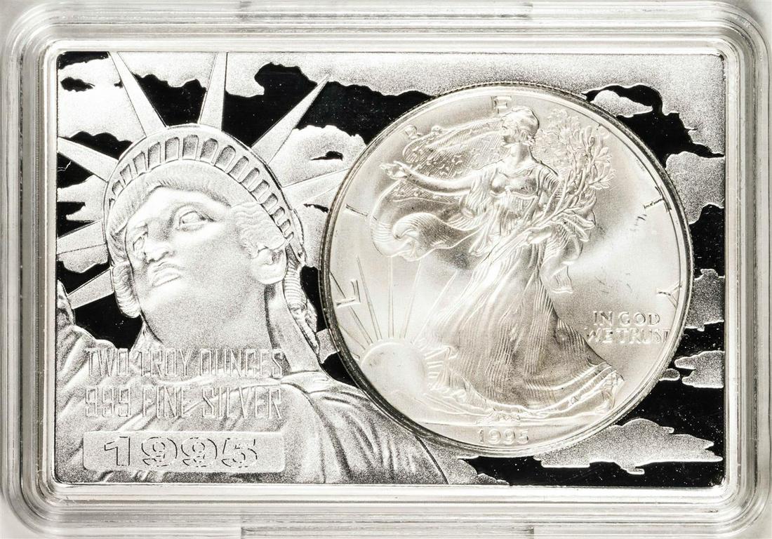 1995 $1 American Silver Eagle Coin & 2oz Silver Bar Set: One 1995 $1 American Silver Eagle Coin & 2oz Silver Bar Set.
