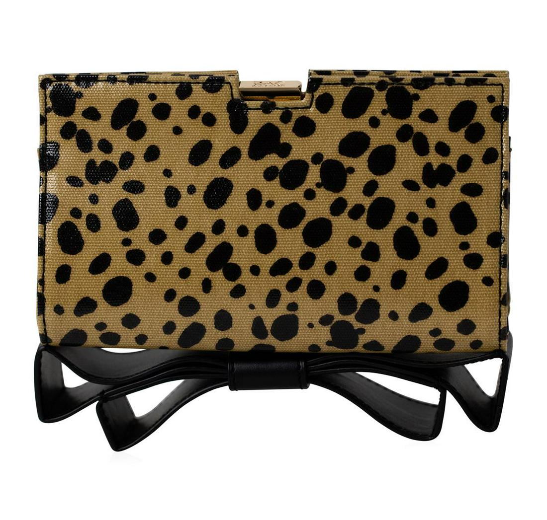 NWT Zac Posen Leopard Print Bow Clutch Bag: Authentic new with tag Zac Posen Leopard Print Clutch with black bow detail. This pretty little hand-held clutch is the perfect way to add some spice to an evening look. Zac Posen does not disappoint 