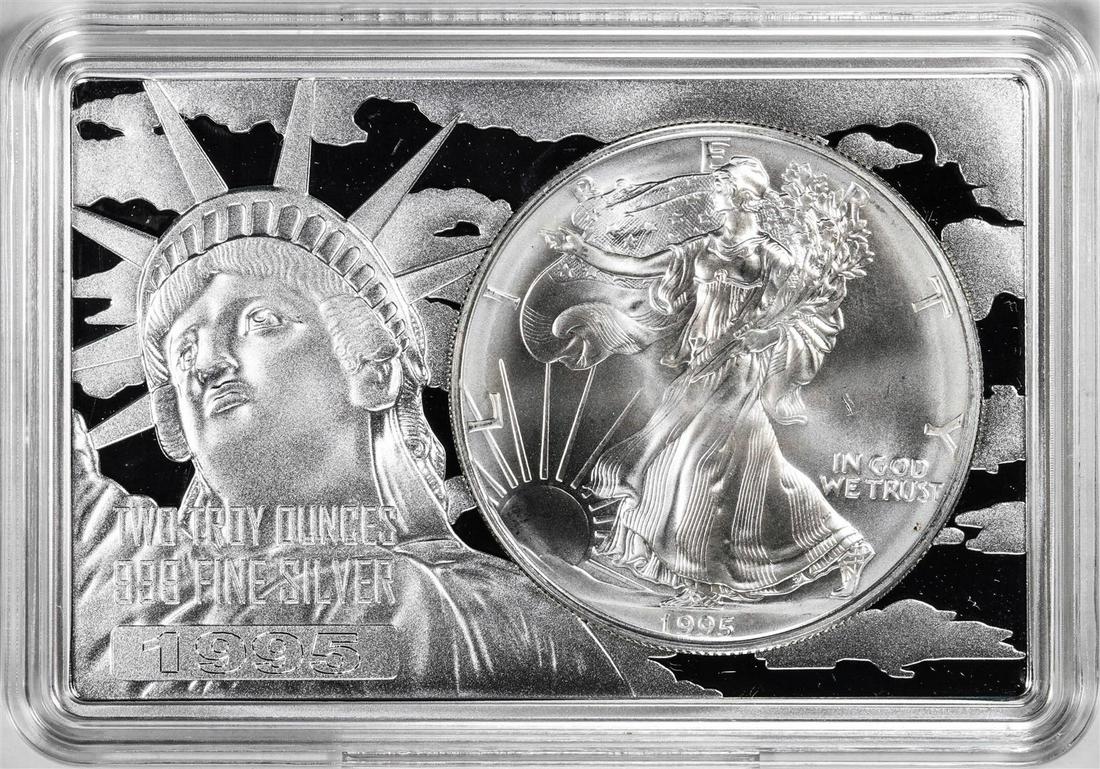1995 $1 American Silver Eagle Coin & 2oz Silver Bar Set: One 1995 $1 American Silver Eagle Coin & 2oz Silver Bar Set.