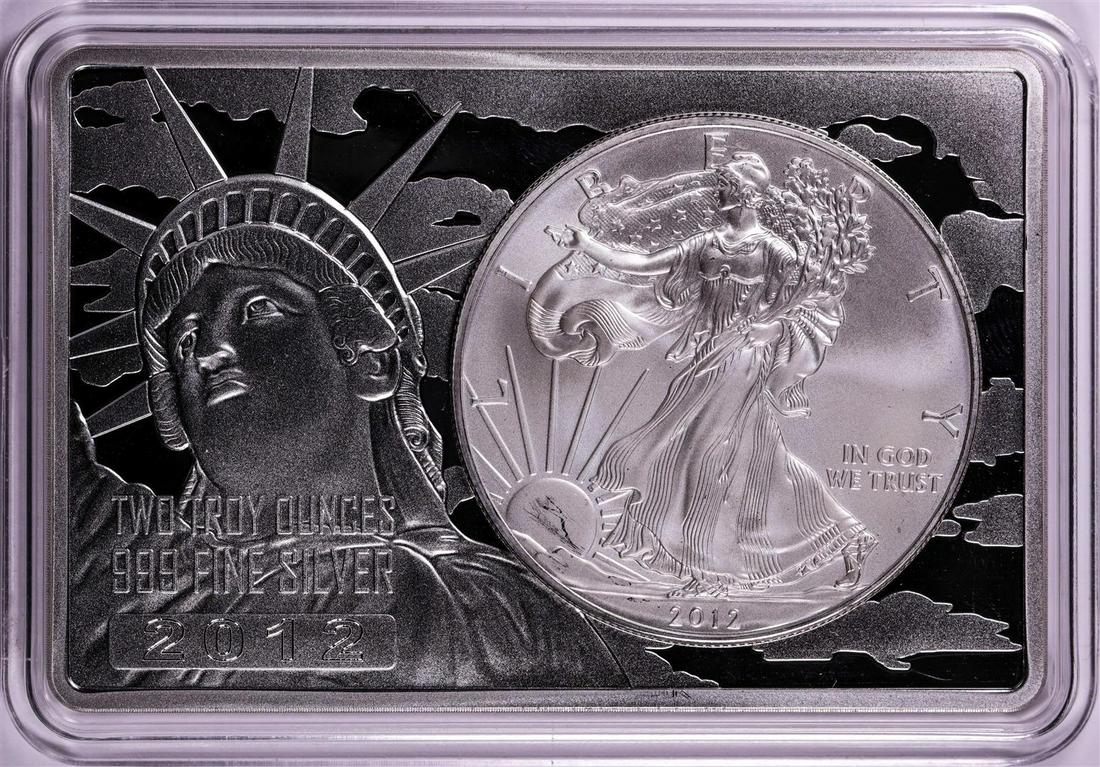 2012 $1 American Silver Eagle Coin & 2oz Silver Bar Set: One 2012 $1 American Silver Eagle Coin & 2oz Silver Bar Set.