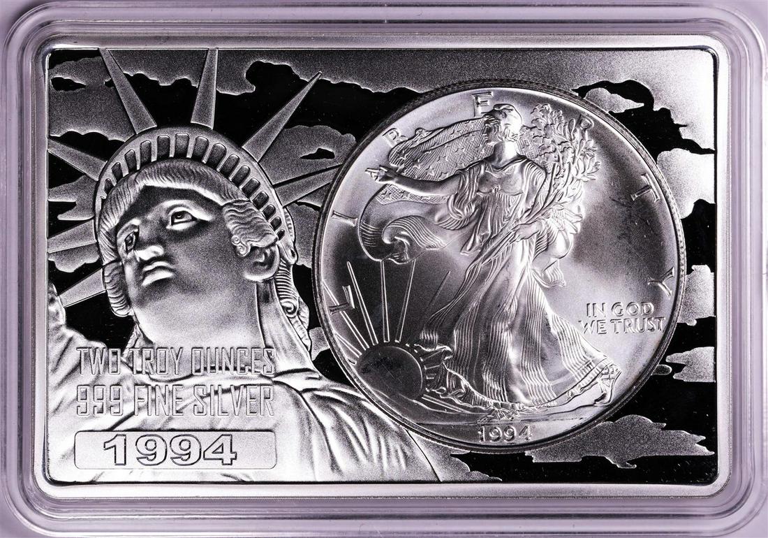 1994 $1 American Silver Eagle Coin & 2oz Silver Bar Set: One 1994 $1 American Silver Eagle Coin & 2oz Silver Bar Set.