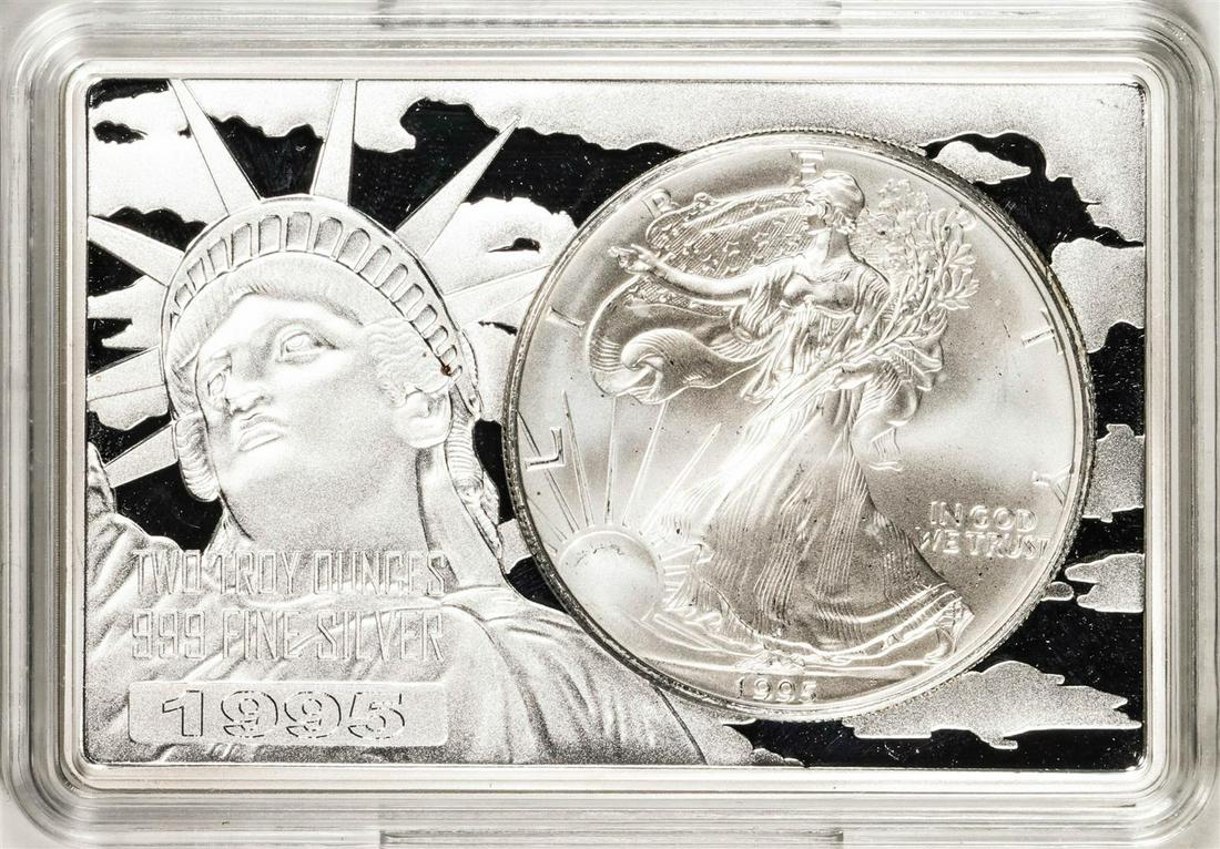 1995 $1 American Silver Eagle Coin & 2oz Silver Bar Set: One 1995 $1 American Silver Eagle Coin & 2oz Silver Bar Set.