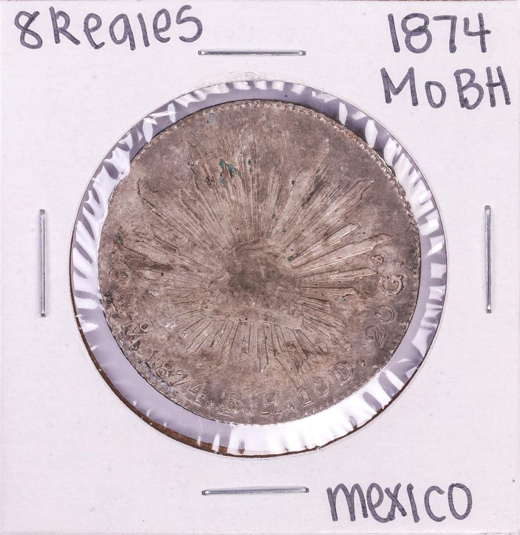 1874 Mo BH Mexico 8 Reales Silver Coin: One 1874 Mo BH Mexico 8 Reales Silver Coin.