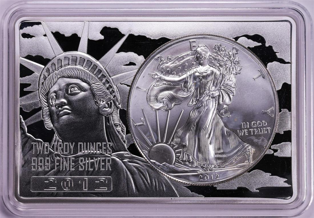 2012 $1 American Silver Eagle Coin & 2oz Silver Bar Set: One 2012 $1 American Silver Eagle Coin & 2oz Silver Bar Set.