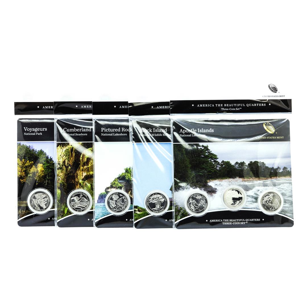 Lot of (5) 2018 America The Beautiful Three-Coin Quarter Sets: Lot of (5) 2018 America The Beautiful Three-Coin Quarter Sets, including (1) three coin set from each of the following:.