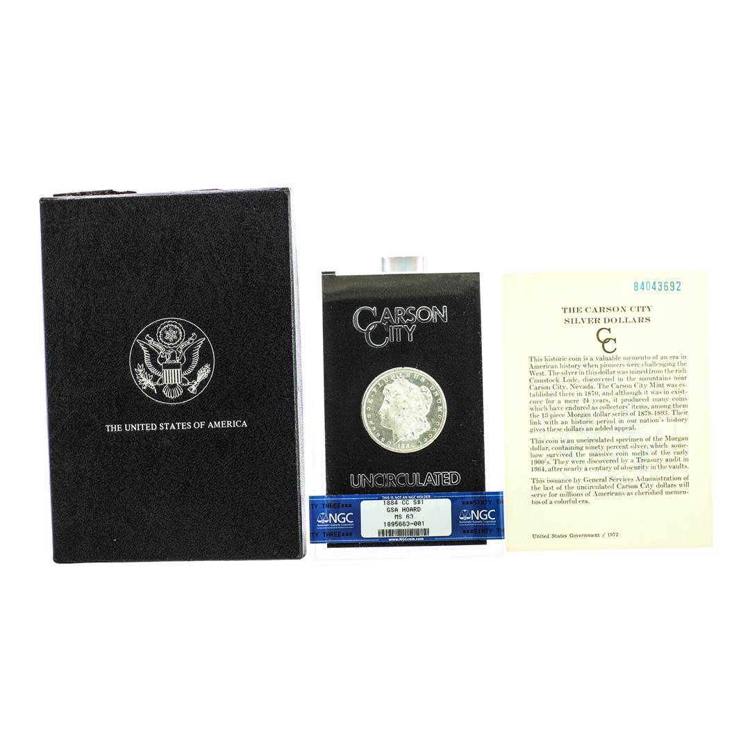 1884-CC $1 Morgan Silver Dollar Coin GSA Hoard Uncirculated w/Box & COA NGC MS63: One 1884-CC $1 Morgan Silver Dollar Coin GSA Hoard Uncirculated w/Box & COA NGC MS63. NGC Certified.