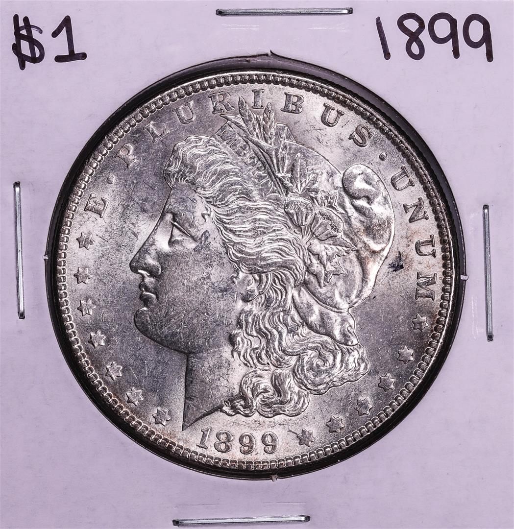 1899 $1 Morgan Silver Dollar Coin: One 1899 $1 Morgan Silver Dollar Coin.