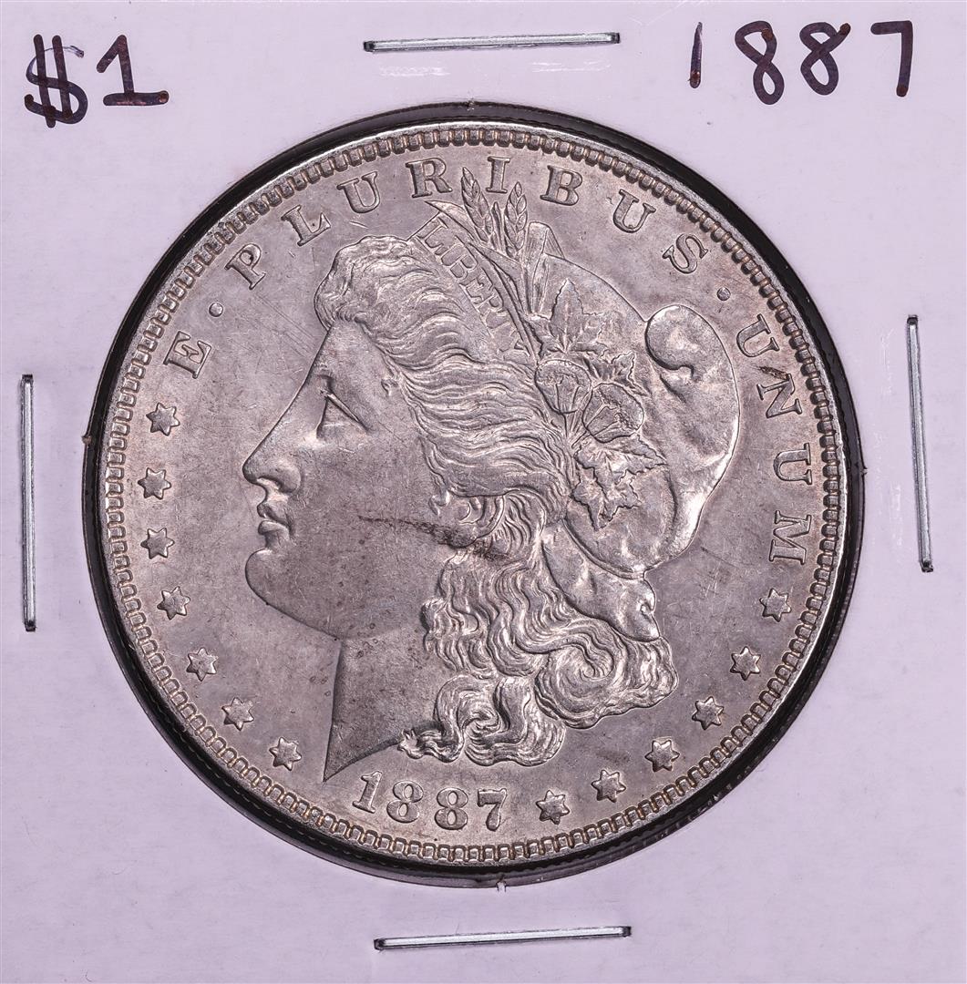 1887 $1 Morgan Silver Dollar Coin: One 1887 $1 Morgan Silver Dollar Coin.