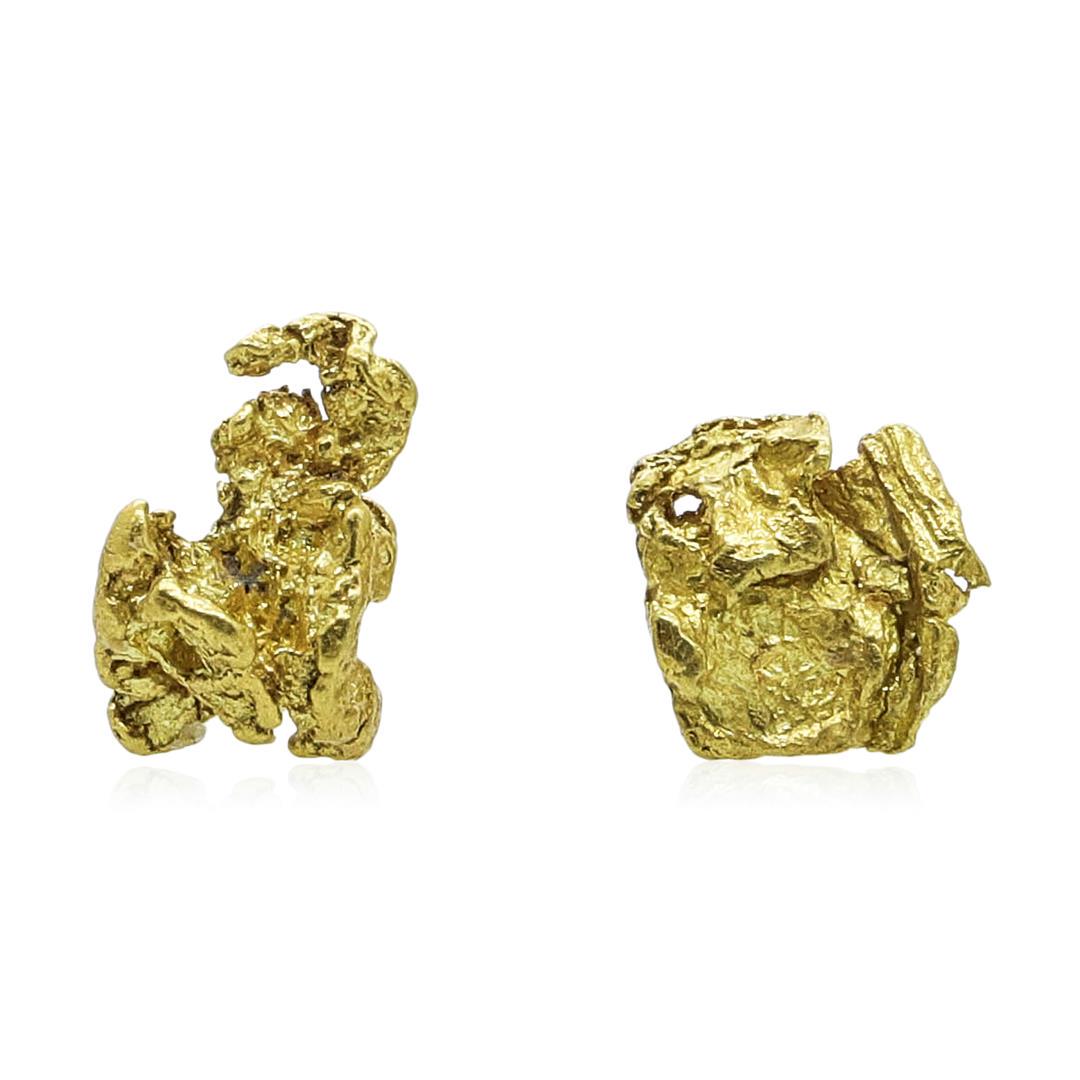 Lot of Gold Nuggets 1.61 Grams Total Weight: One Lot of Gold Nuggets 1.61 Grams Total Weight.