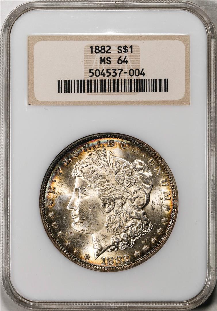 1882 $1 Morgan Silver Dollar Coin NGC MS64 Amazing Toning Old Holder: One 1882 $1 Morgan Silver Dollar Coin NGC MS64 Amazing Toning Old Holder. NGC Certified.