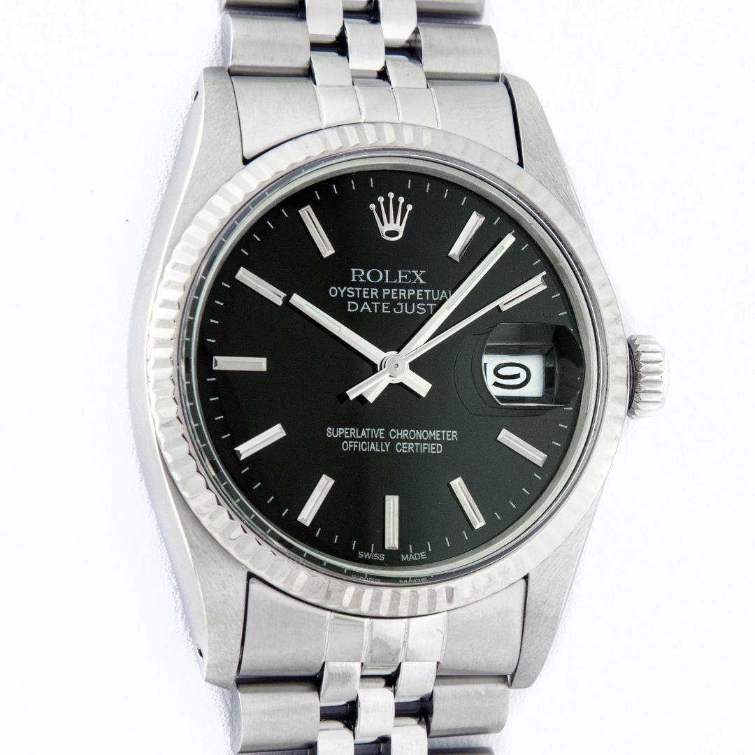 Rolex Mens Stainless Steel Black Index Datejust Wristwatch: One Mens Pre Owned Rolex Datejust Polished, Serviced & Electronically Tested, Rolex Stainless Steel Case: 36mm, Rolex Stainless Steel Crown, Rolex Bezel: 14K White Gold Fluted Bezel. Custom Crystal: A