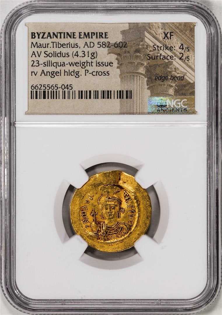 AD 582-602 Byzantine Empire Maurice Tiberius AV Solidus Ancient Gold Coin NGC XF: One AD 582-602 Byzantine Empire Maurice Tiberius AV Solidus Ancient Gold Coin NGC XF. NGC Certified.
