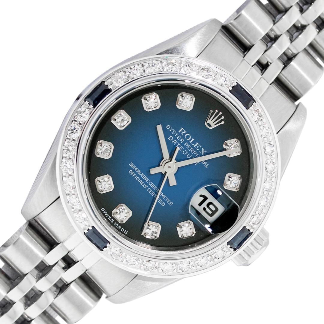 Rolex Ladies Stainless Steel Sapphire and Diamond Datejust Wristwatch: One Ladies Pre Owned Quickset Stainless Steel Rolex Datejust Polished Bright with Satin Finish, Serviced & Electronically Tested, Stainless Steel Case: 26mm, Rolex Stainless Steel Crown, Custom Bezel: