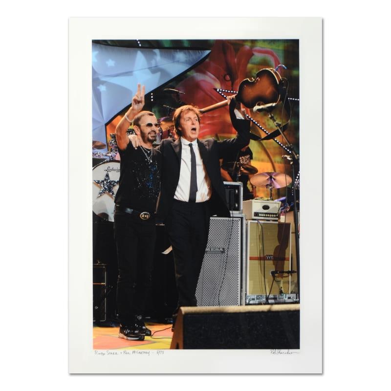 Rob Shanahan "Ringo Starr & Paul Mccartney" Limited Edition Giclee On Paper: "Ringo Starr & Paul McCartney" is a limited edition giclee on paper, numbered and hand signed by acclaimed music industry photographer Rob Shanahan. Includes Certificate of Authenticity. Measures appr
