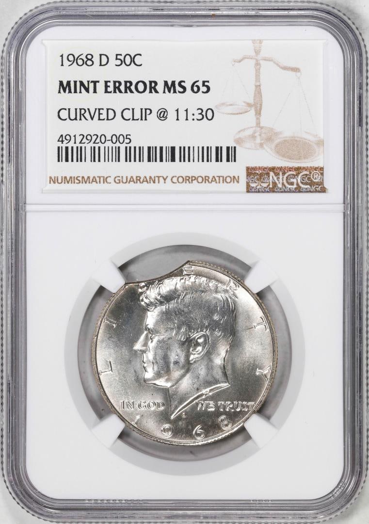 1968-D Kennedy Half Dollar Coin Mint Error - Curved Clip @ 11:30 NGC MS65: One 1968-D Kennedy Half Dollar Coin Mint Error - Curved Clip @ 11:30 NGC MS65. NGC Certified.