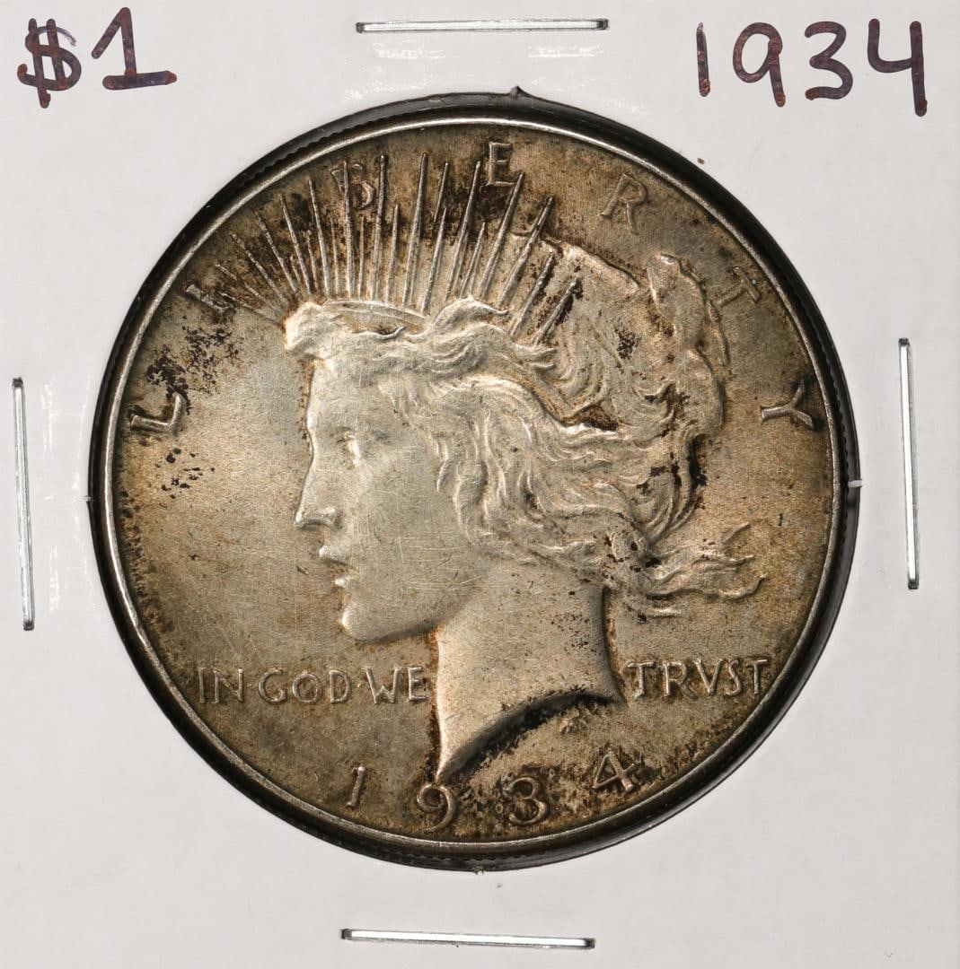 1934 $1 Peace Silver Dollar Coin: One 1934 $1 Peace Silver Dollar Coin.