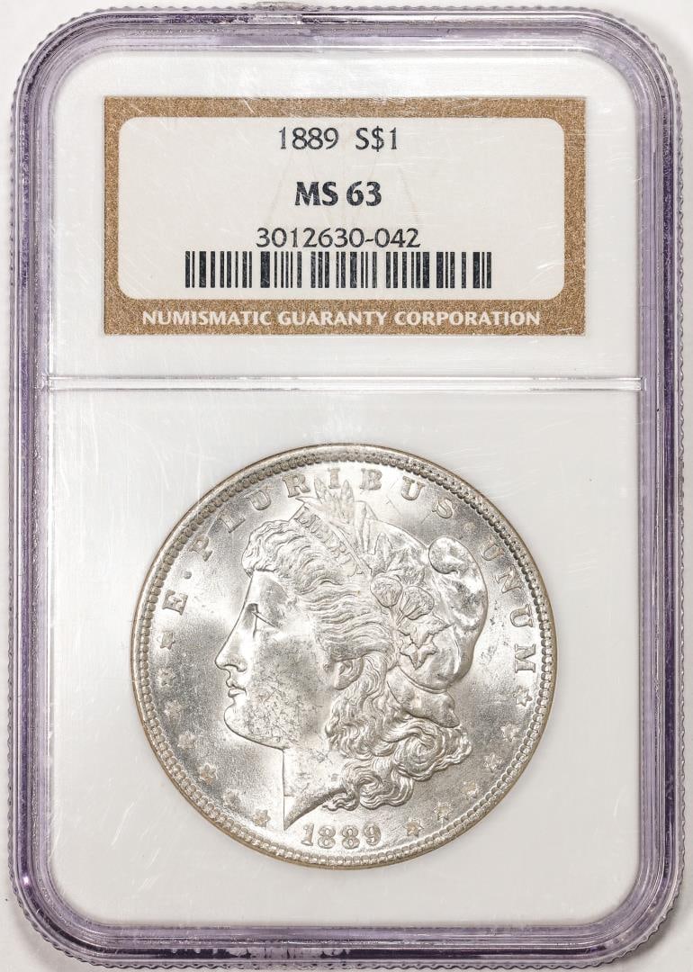 1889 $1 Morgan Silver Dollar Coin NGC MS63: One 1889 $1 Morgan Silver Dollar Coin NGC MS63. NGC Certified.