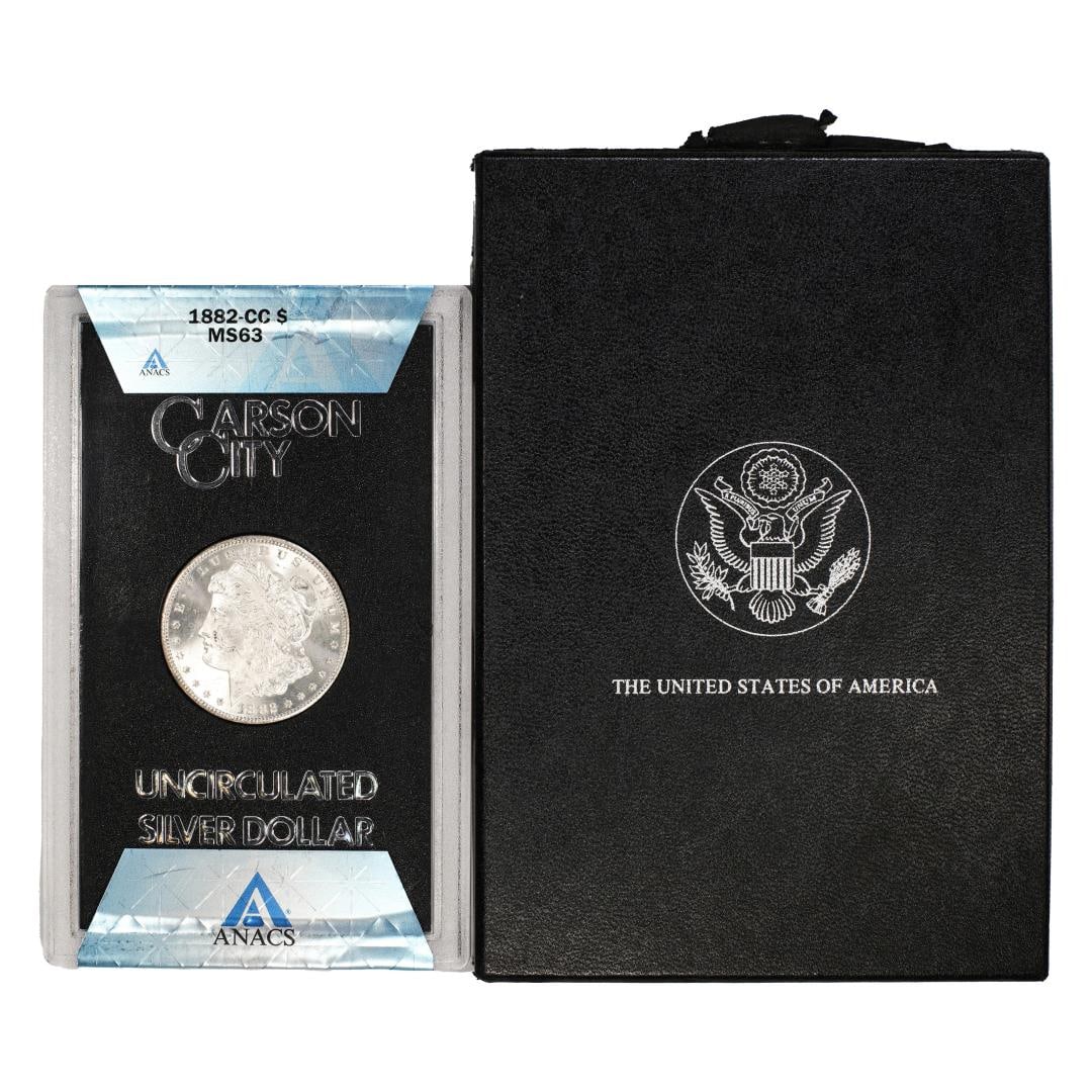 1882-CC $1 Morgan Silver Dollar Coin GSA Hoard Uncirculated ANACS MS63 w/Box: One 1882-CC $1 Morgan Silver Dollar Coin GSA Hoard Uncirculated ANACS MS63 w/Box. ANACS Certified.